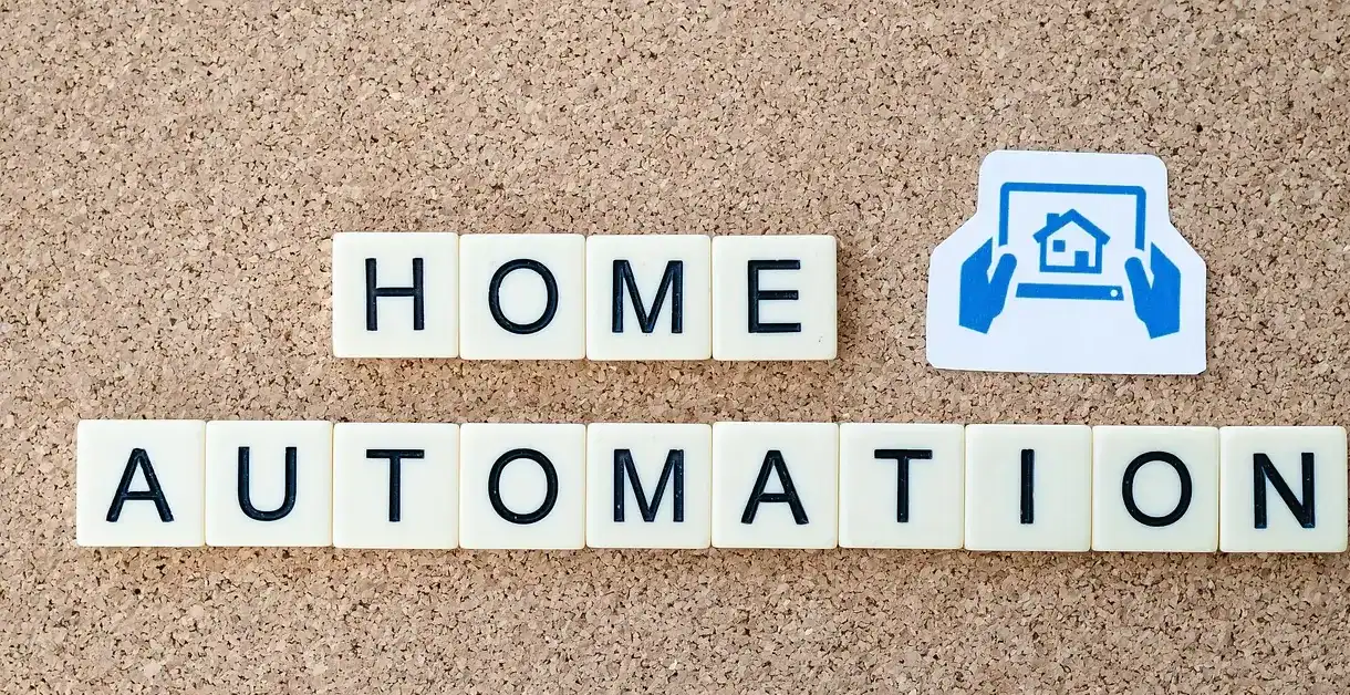 Home automation concept with letter tiles and smart home icon.