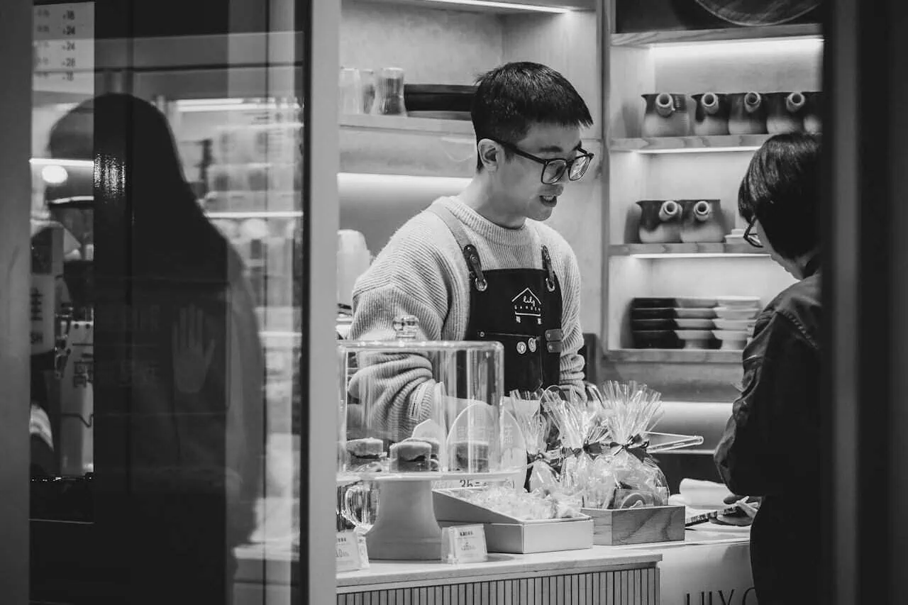 Impulse buying hacks: person rethinking a purchase in a store