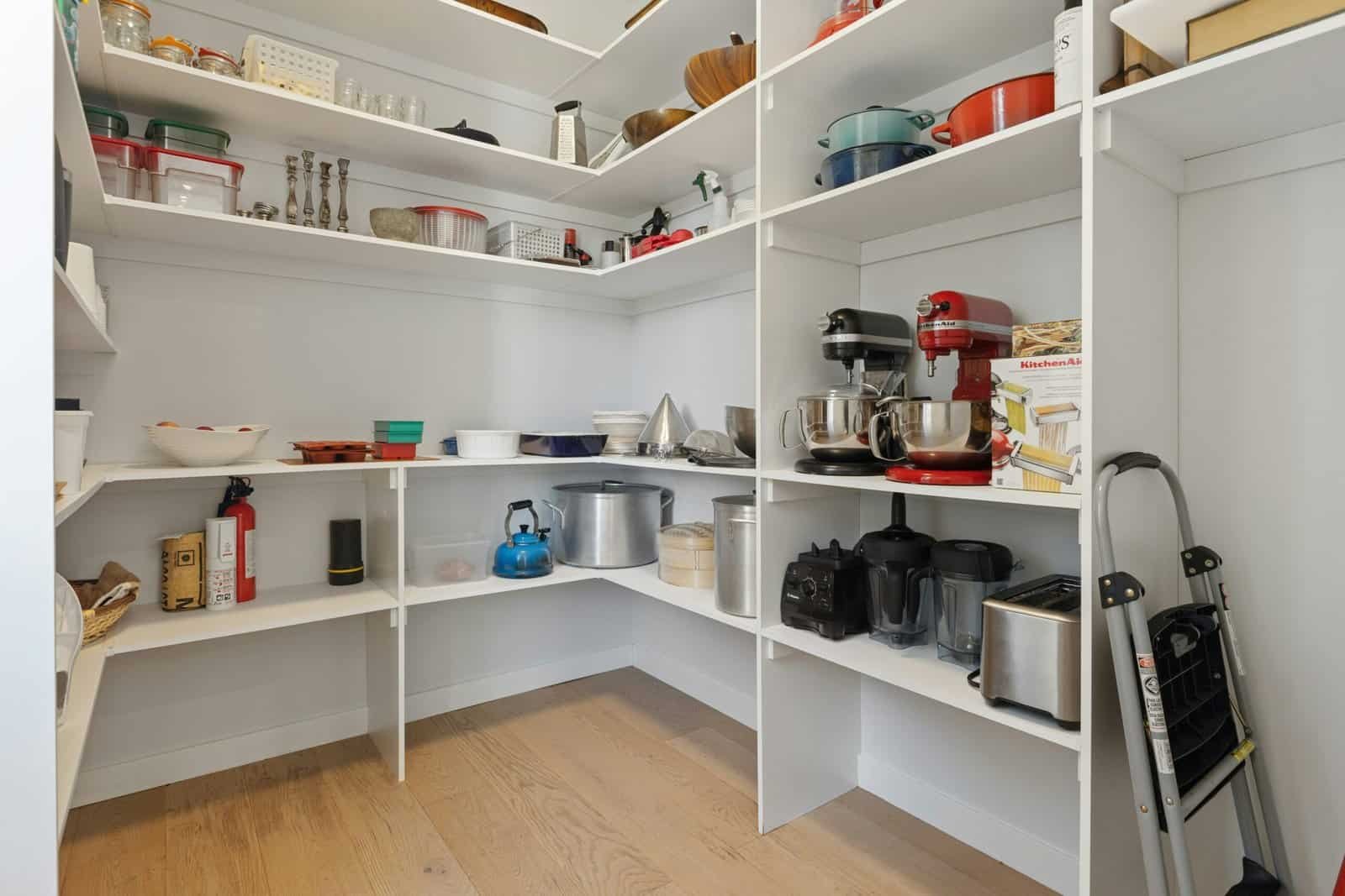 Efficient small space storage solutions for kitchens, including shelves and organization tips for ma.