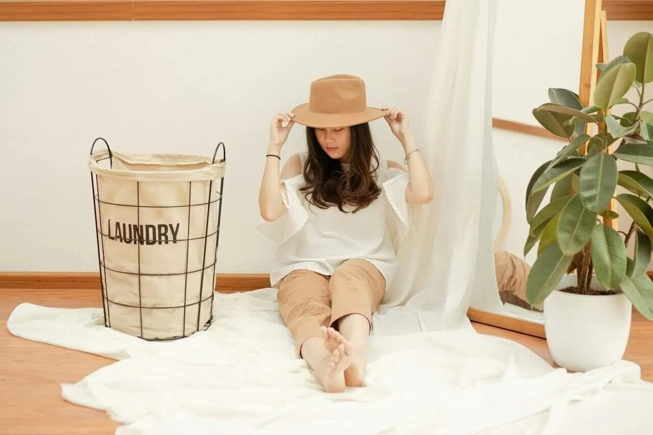 Laundry hacks to keep clothes looking new: fresh laundry drying on a line