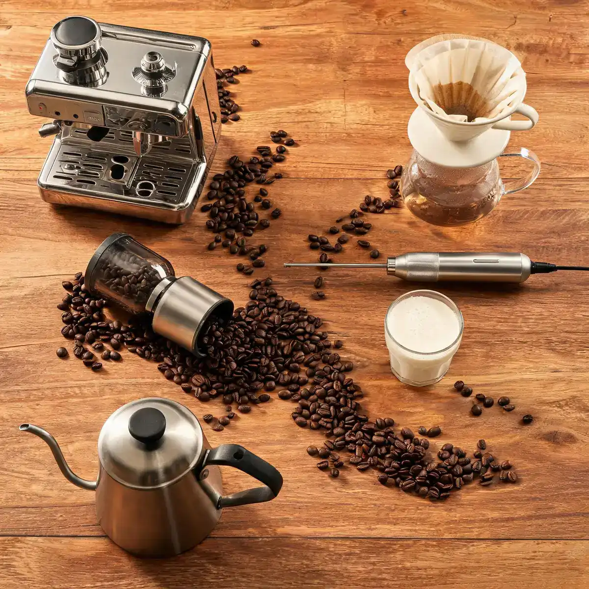 Best espresso and brewing gear flat lay: burr coffee grinder, espresso machine, French press, and milk frother